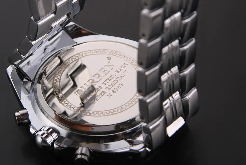 CURREN 8083 Reloj para Hombre Impermeable con Banda de Acero y Calendario